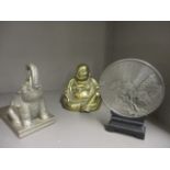 A selection of Eastern ornaments to include a brass Buddha