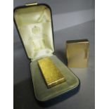 A gold plated Dunhill cigarette lighter, boxed and a DuPont gold plated cigarette lighter