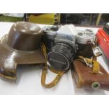 A faux leather cased Minolta SR-3 camera