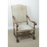 A 19th Century French walnut Armchair with upholstered back and seat, shaped and carved arms with