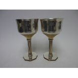 A pair of modern Limited Edition silver and parcel gilt Wells Cathedral Goblets commemorating 8th