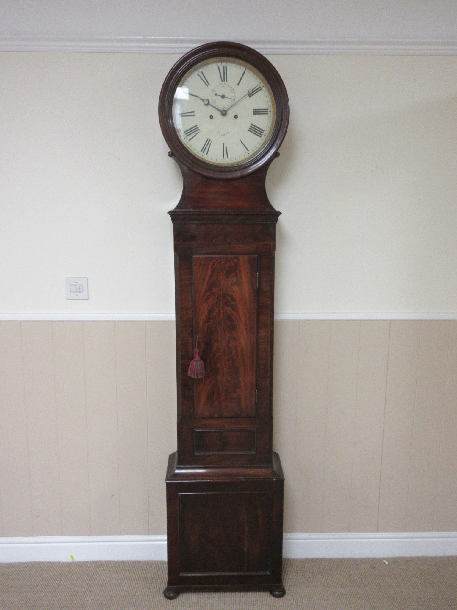 A 19th Century Scottish mahogany Longcase Clock having circular enamel dial inscribed Millar, Leith,