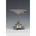A Victorian silver Epergne with frosted glass dish surmount above fruiting vine support having