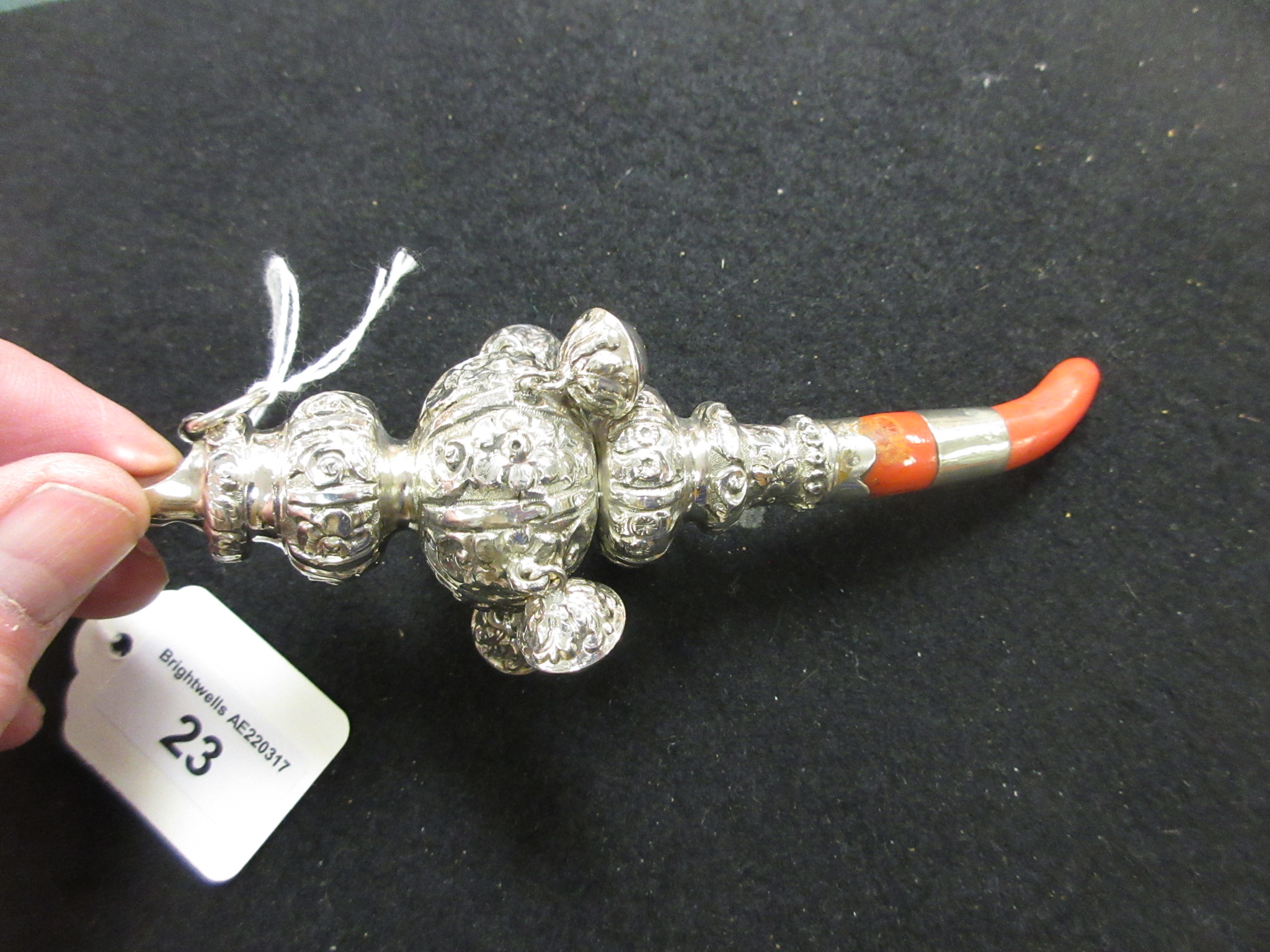 A Victorian silver Rattle with floral embossing and five applied bells, Birmingham circa 1890 - Image 4 of 5