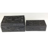 Two 19th Century Sinhalese carved ebony rectangular Boxes similar, deeply carved all over with