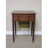 A Regency mahogany Writing/Work Table with satinwood stringing, fitted writing slope, drawer and
