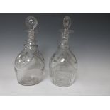 A pair of Georgian Irish glass baluster Decanters with moulded stoppers, triple ring neck,