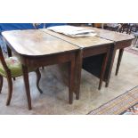 A late Georgian mahogany Dining Table with central dropleaf section and pair of D-ends on square