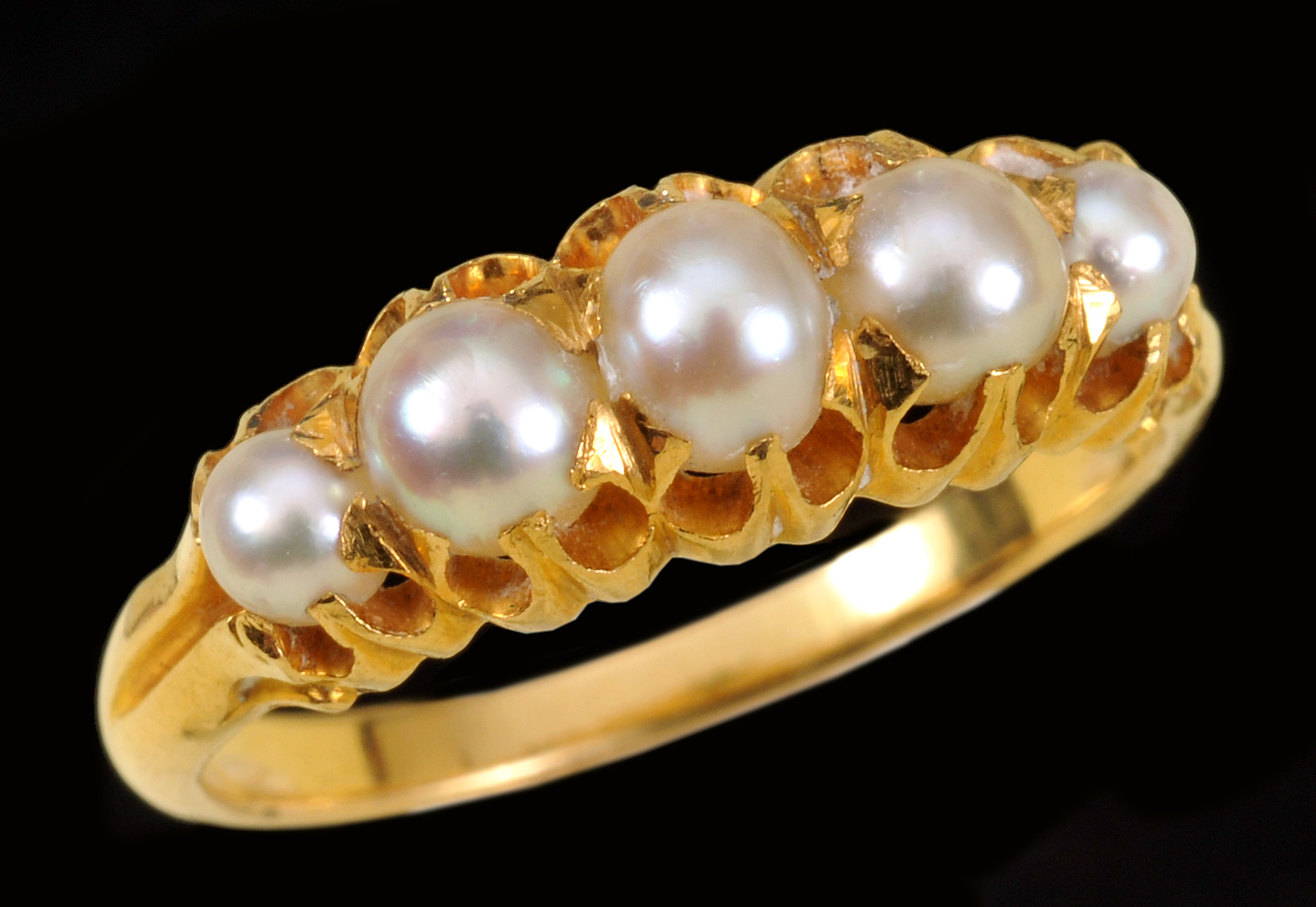 A Pearl Ring set five graduated pearls, ring size M 1/2