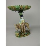 A Majolica Comport with oval moulded dish top on rustic stem with donkey and boy figure on oval