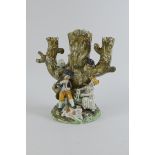 An early 19th Century Stump Group with figures and animals, 10 1/2in H, restored