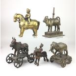 Four 19th Century Indian metal Toys and a figure of Nandin,The pull along toys including a horse and