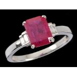 A Ruby and Diamond Ring corner claw-set step-cut ruby, 1.40cts, between two pairs of channel-set