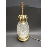 A Waterford cut glass baluster Table Lamp with brass leaf decorated top and circular plinth on three
