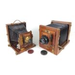 Two early 20th Century mahogany and brass Field Cameras, Comprising a W. Watson & Sons "Premiere"