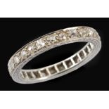A Diamond Eternity Ring millegrain-set old-cut stones in white gold, stamped 18ct, ring size M