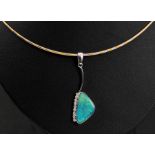 A contemporary Opal and Diamond Pendant, the triangular opal slice rub-over set with a row of