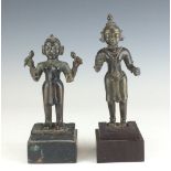 Two 18th Century Indian bronze Figures,Bengal,One four armed female deity holding lotus buds on