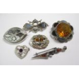 A Collection of six Scottish Brooches set hardstones, four stamped silver