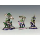 Three early 20th Century enamelled silver and seed pearl figural Gaming Pieces, Jaipur or Benares,