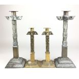 Two pairs of Sinhalese engraved brass Candlesticks similar, 14 and 10 in high (4)
