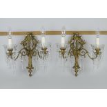 A pair of two branch Wall Lights with central figures, glass pendants drops, 13in