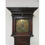 An early 18th Century Longcase Clock with 10 inch square brass dial inscribed Plimer Wellington,