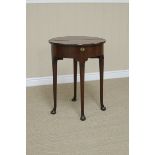 An antique walnut 'D' shaped Table with fold-over top on turned supports and pad feet