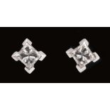 A pair of Diamond Ear Studs each corner claw-set princess-cut stones in 18ct white and yellow gold