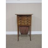 A 19th Century mahogany Work Table with hinged octagonal top above two dummy and two real drawers