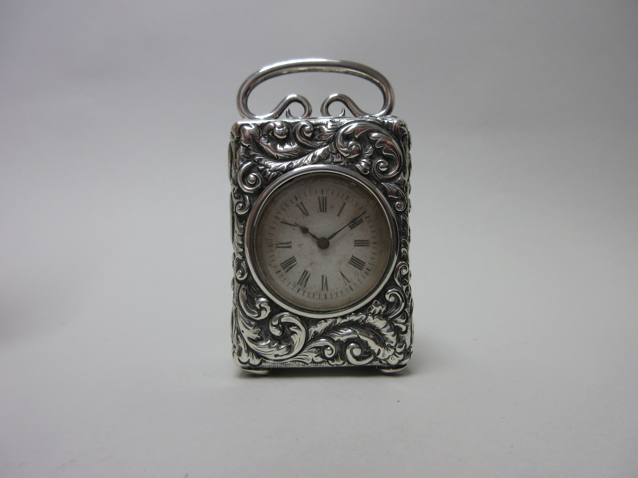 A Victorian silver cased small Carriage Clock with scroll embossing, London 1897, 3in - Image 2 of 2