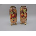 A pair of Royal Worcester cylindrical Vases, with pierced trellis band to top, painted apples,