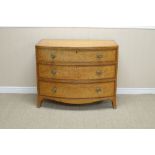 A Regency satinwood bow front Chest of three long cross-banded drawers beneath cross-banded top on