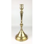 An Ottoman brass Candlestick,Turkey,slender baluster form on large conical foot, 16 1/2 in H