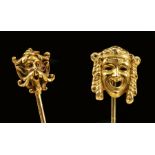 Two gold Stick Pins with theatrical mask finials