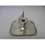 A Victorian silver oblong Chamber Candlestick and Snuffer engraved crest and motto, beaded rim,