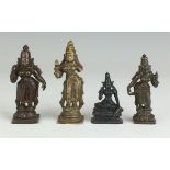 Four small 19th Century Indian metal Figures of Parvarti, Three standing and one seated, all holding