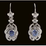 A pair of Sapphire and Diamond Ear Pendants each millegrain-set cushion-cut sapphire approx 2cts, on