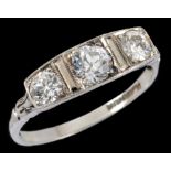 An Art Deco Diamond three stone Ring millegrain-set graduated old-cut stones in platinum, ring