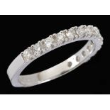A Diamond half Eternity Ring claw-set brilliant-cut stones in 18ct white gold, ring size J