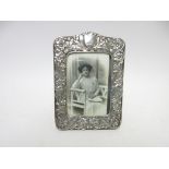 An Edward VII silver Photograph Frame with floral embossing and vacant cartouche, Birmingham 1902, 8