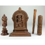 Four Indian carved wood items,Comprising a figure of Ganesha, a figure of Krishna playing his flute,