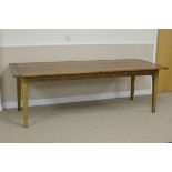 A French fruitwood Dining Table with cleated plank top on square tapering legs, 7ft 9in x 3ft