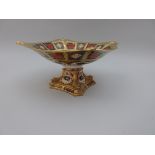 A Royal Crown Derby square Comport with dolphin moulded corners, and also on the shaped square