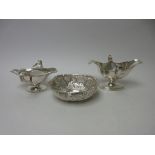 An Edward VII silver double lipped two handled Sauce Boat, London 1904, another, Birmingham 1942 and