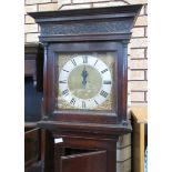 An antique oak Longcase Clock with square brass dial, silver chapter ring inscribed John