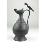 A Khorasan bronze Ewer, 12th/13th CenturyPersia,Of pear form on splayed foot, engraved with Arabic