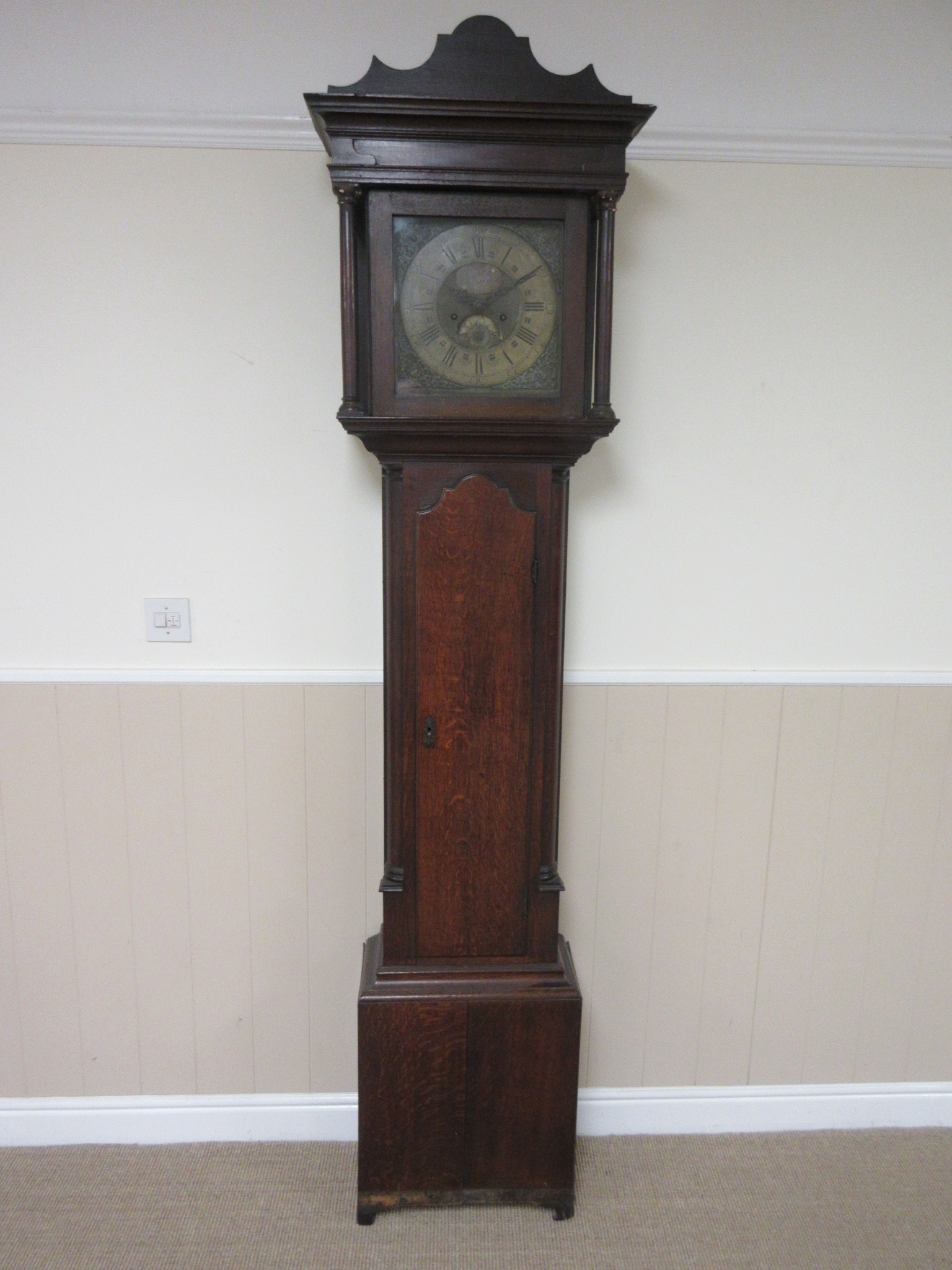 An 18th Century Longcase Clock with 11 inch square brass dial inscribed Hum'y Wainwright, Bunney,