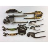 A collection of fifteen Betelnut Cutters,Including a Kutch cutter with stained handles and a