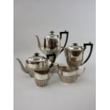 A composite five piece silver Tea and Coffee Service, Dates and makers including Mappin and Webb,